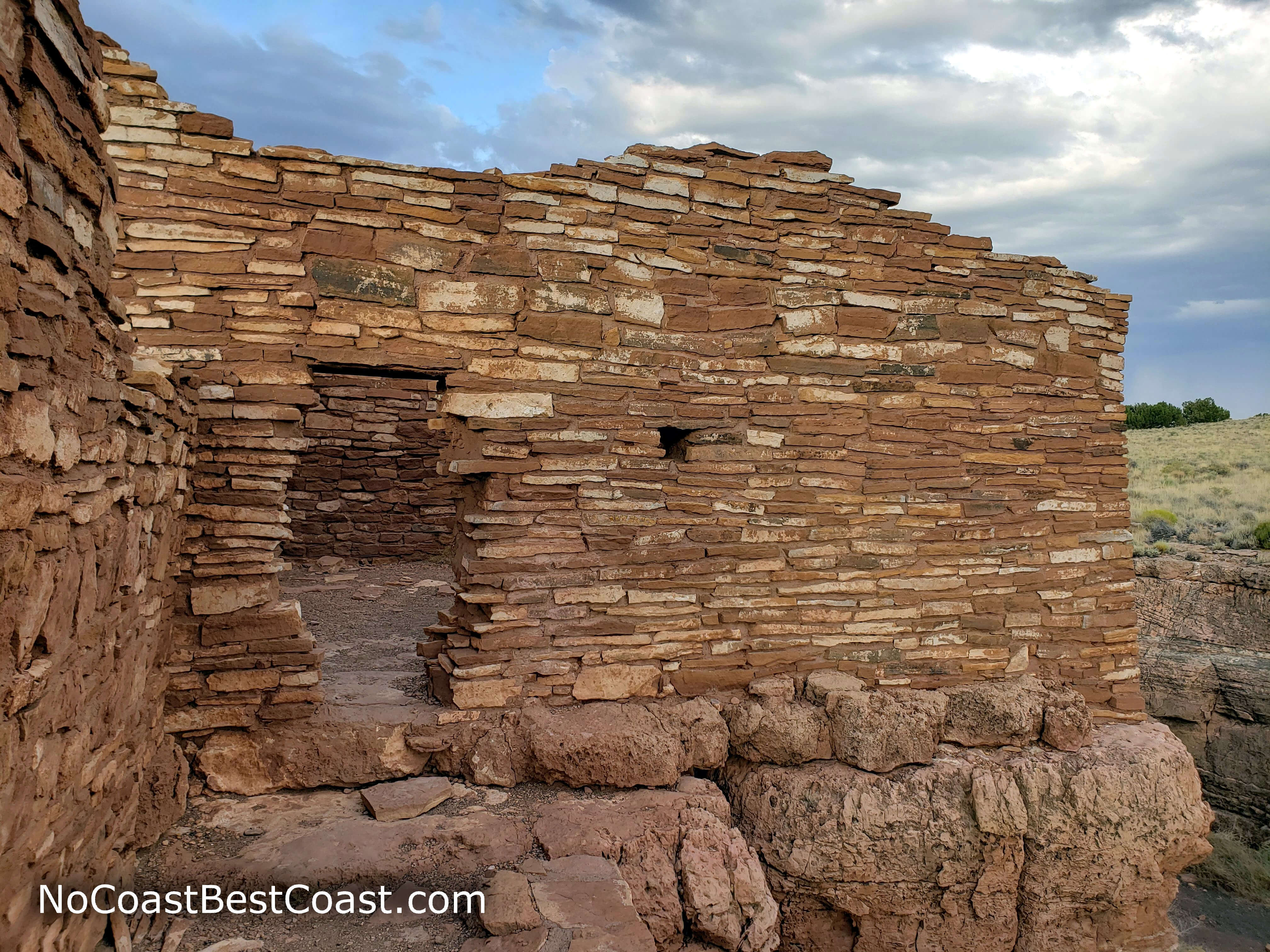 You can enter Lomaki Pueblo through these narrow stone doors