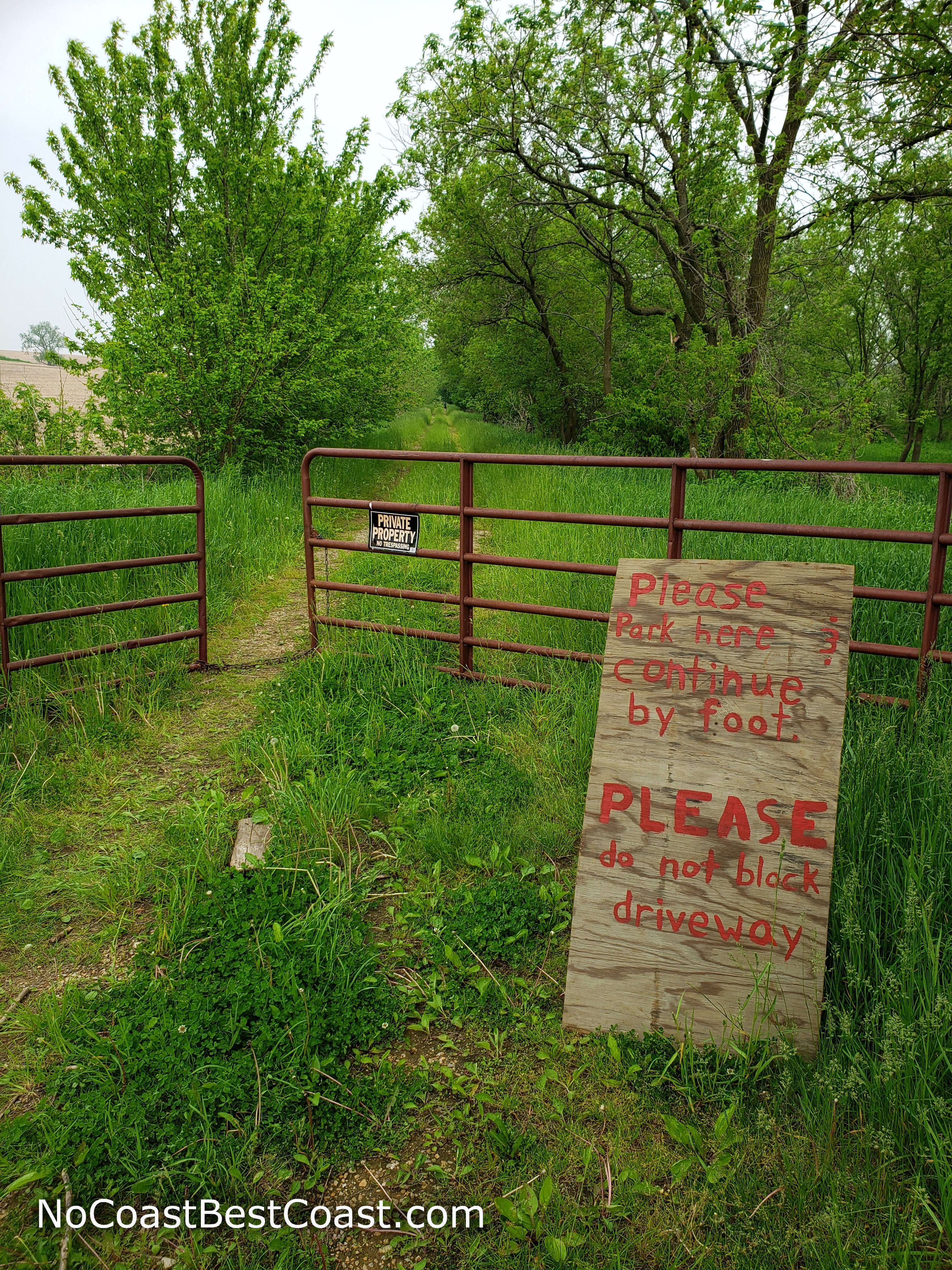 The sign at the gate leading onto the property