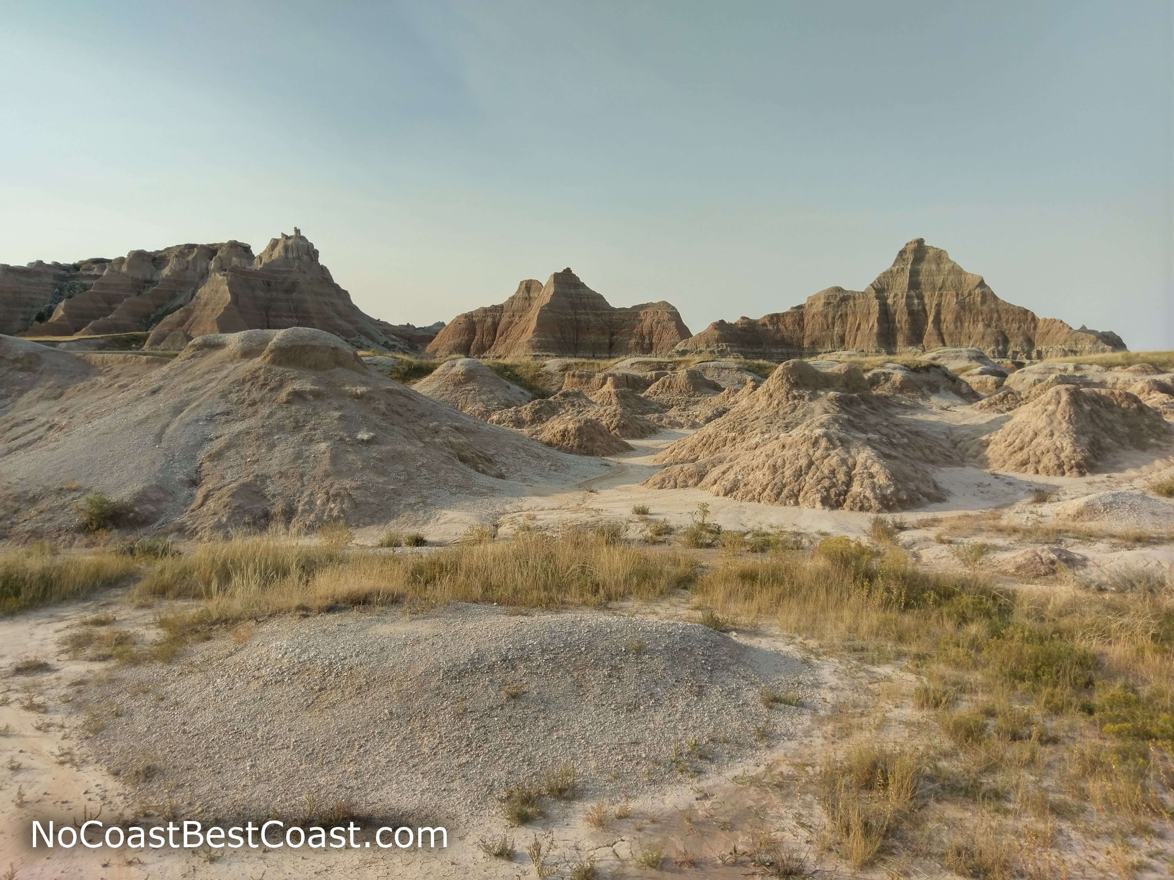 The many colored layers of the badlands formations correspond to different geologic eras