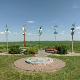 This highpoint monument has signs pointing to every other highpoint in the U.S.