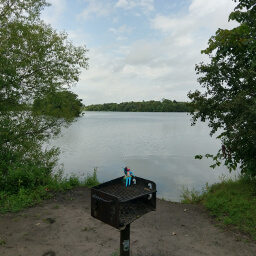 A lost Barbie doll basks on a secret grill on Hyland Lake