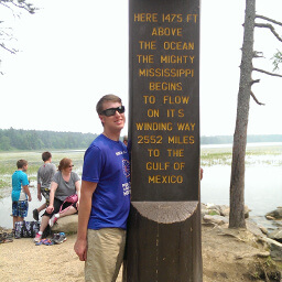 Me posing with the sign at the start of the Mississippi River