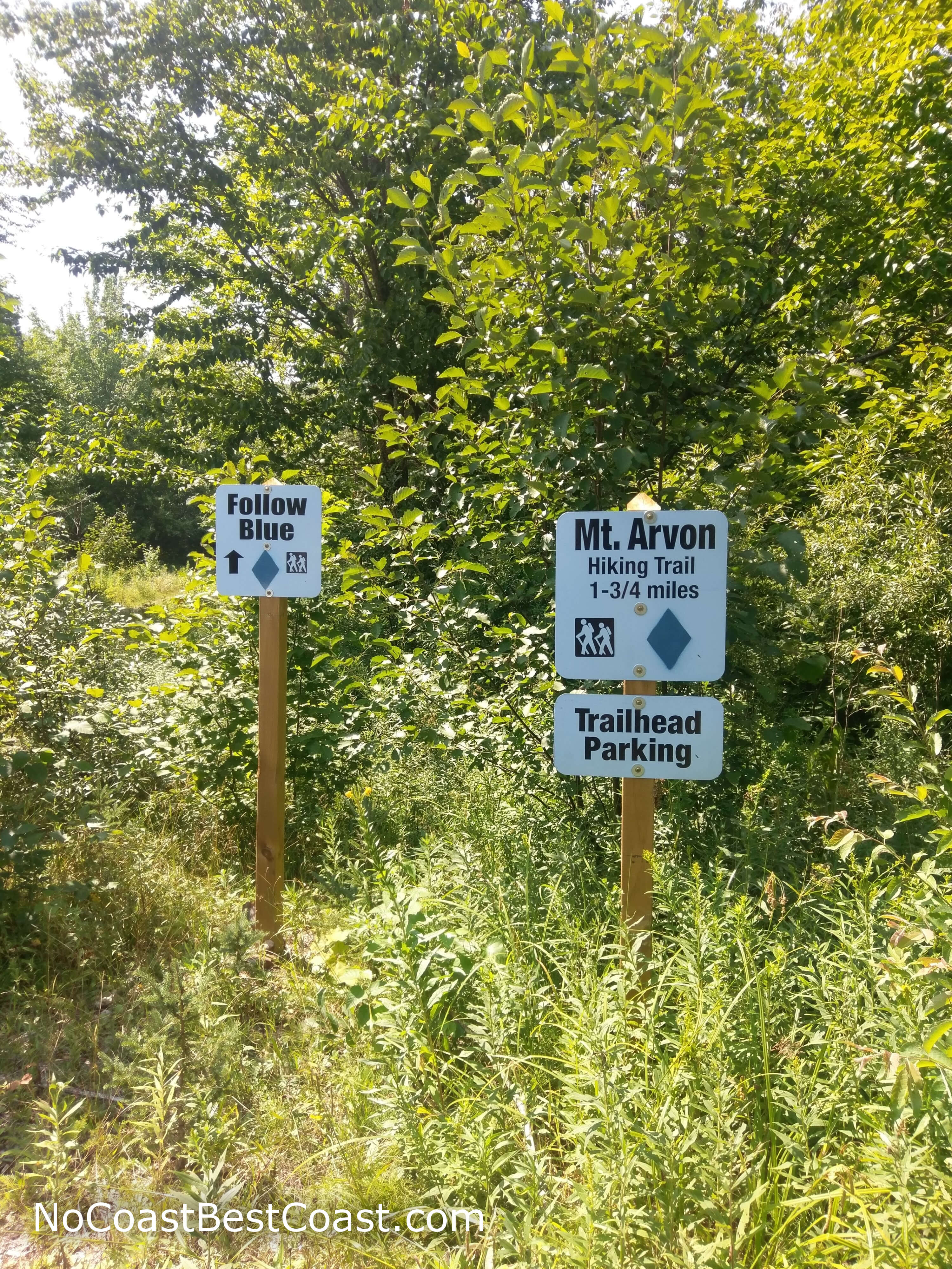 The sign labeling the parking area for Mount Arvon
