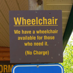 Sign stating a wheelchair is available free of charge