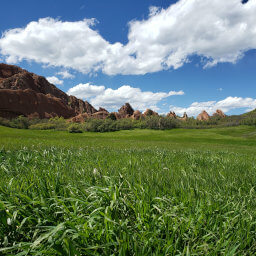 Meadows and sandstone formations on the western half of the Fountain Valley Loop