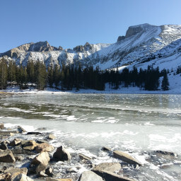 Stella Lake frozen solid with snowy Wheeler Peak above