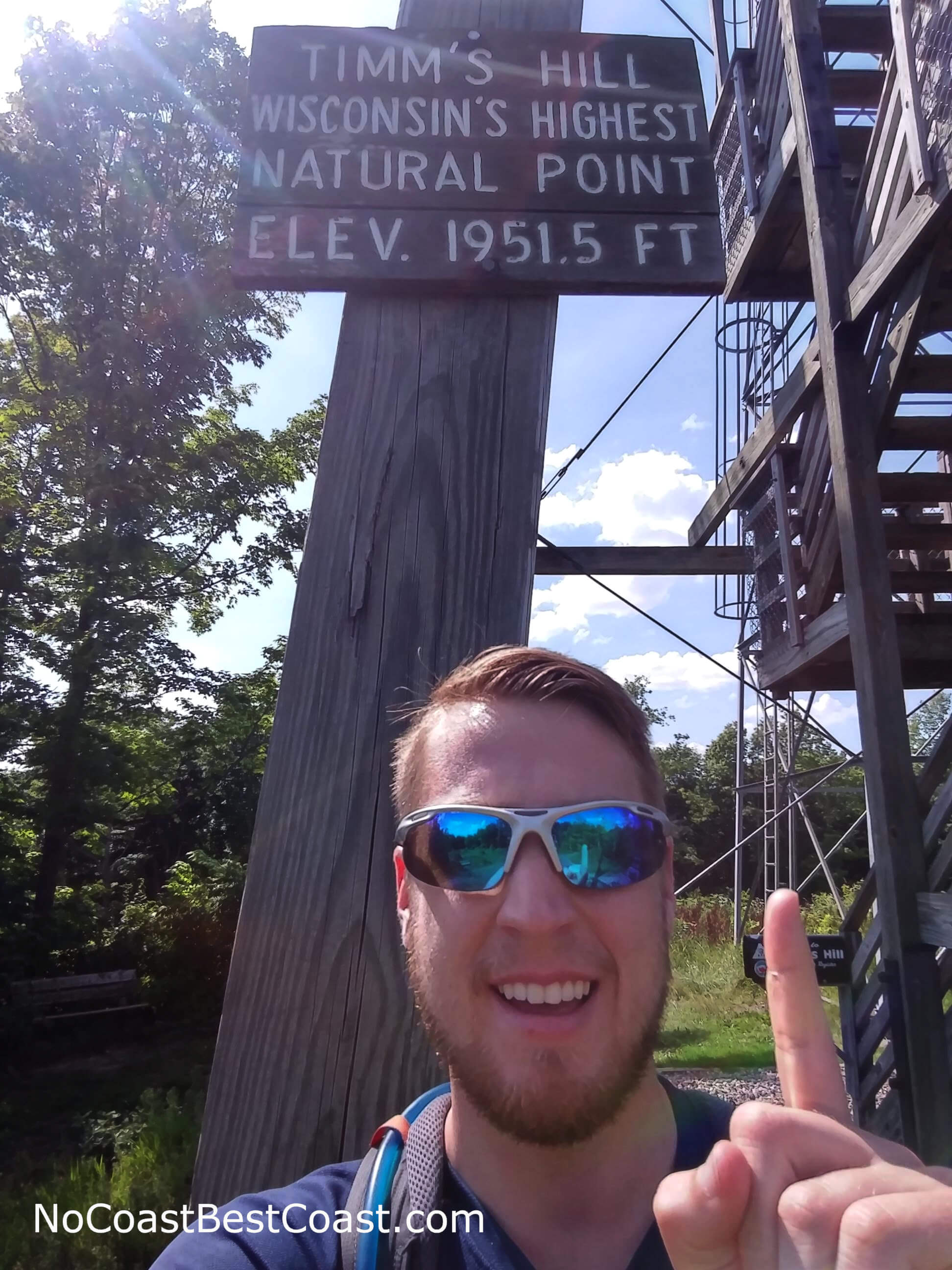 The sign on the observation tower marking the highest elevation in Wisconsin