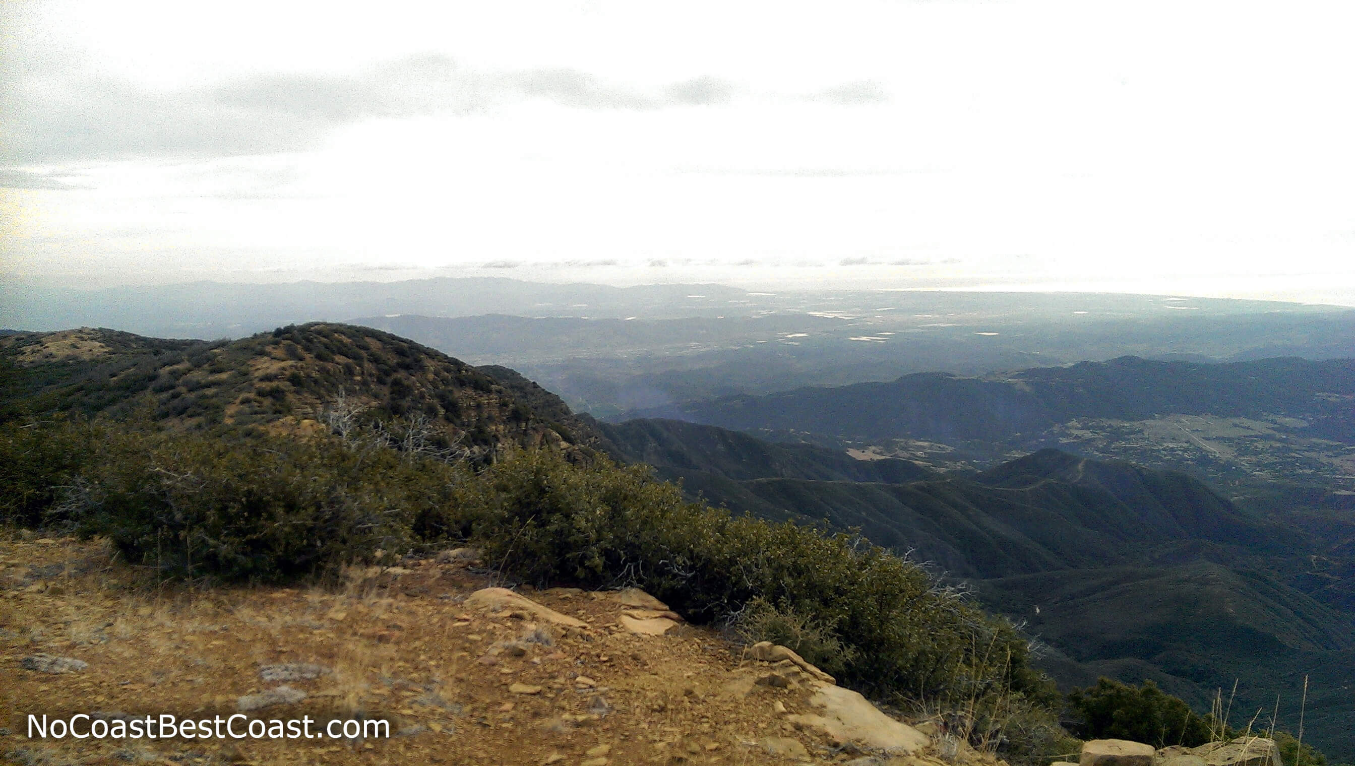 The Ojai Valley thousands of feet below with Ventura, Oxnard, and the Pacific Coast in the distance