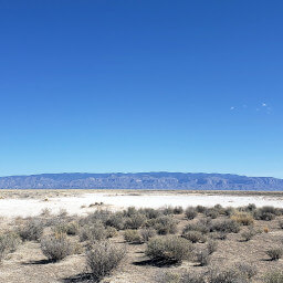 The Sacramento Mountains towering over the flat desert