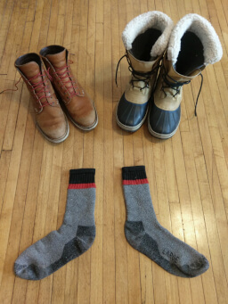 Timberland boots (left), Sorel Pac 1964 Boots (right), and Coleman wool socks
